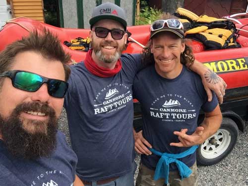 Raft Guides in front of a raft