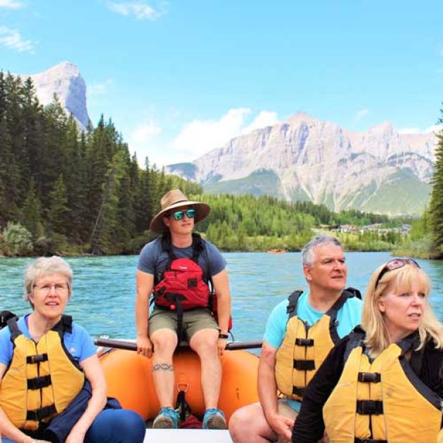 Group rafting on the Bow River