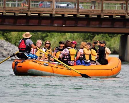 Orange raft leaving the put-in.